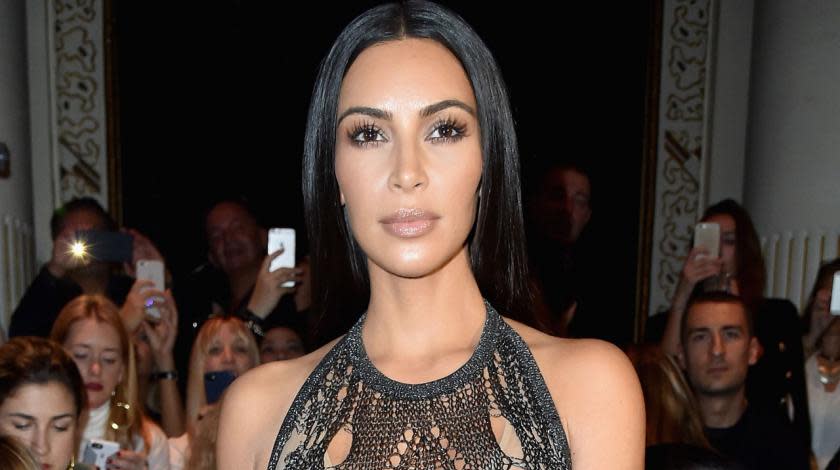 Kim revealed her surrogate was expecting on Sunday night’s episode.