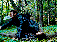 Katniss throwing a spear in anger over Rue's dead body