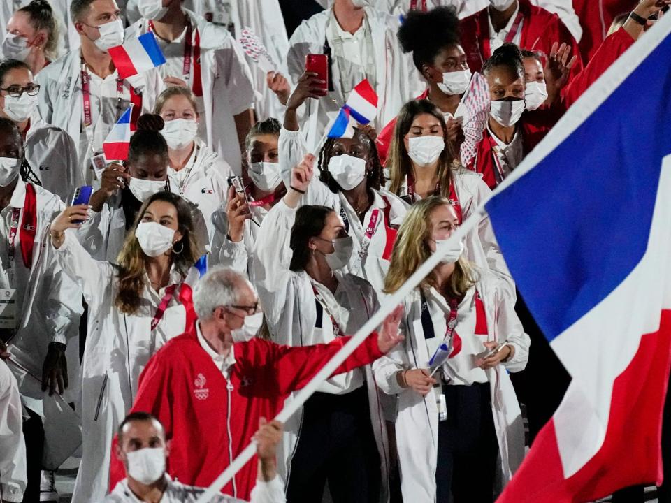 Athletes from France make their entrance at the Summer Olympics.
