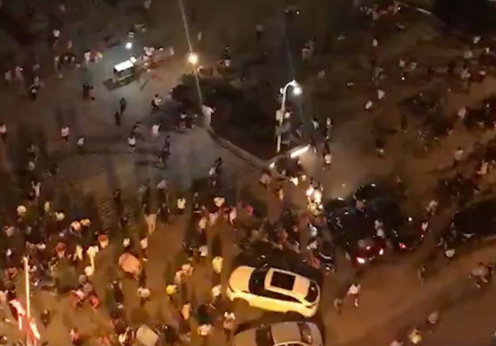 Screengrab shows people fleeing a pedestrian area in the Chinese city of Hengyang in Hunan province after a driver plowed a vehicle into the crowded square. (Photo: Twitter)