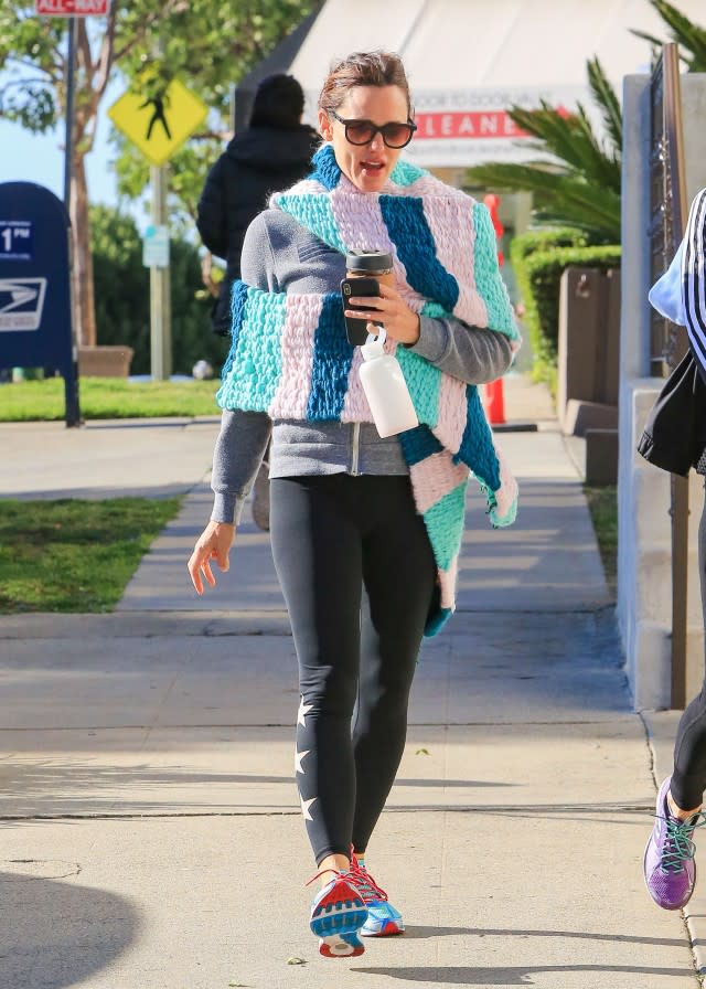 The 46-year-old actress stays cozy in a multi-colored scarf while out in Los Angeles.