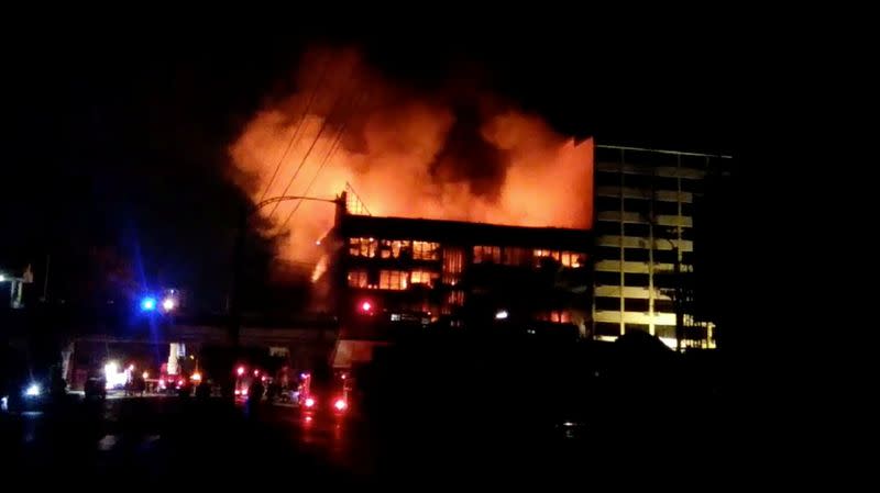 Ruby Mart is engulfed in flames, in Yangon