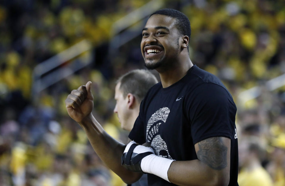 RETRANSMISSION TO CORRECT SCORE - Michigan State forward Nick Ward pumps his fist as State defeats Michigan 77-70 during an NCAA college basketball game, Sunday, Feb. 24, 2019, in Ann Arbor, Mich. (AP Photo/Carlos Osorio)