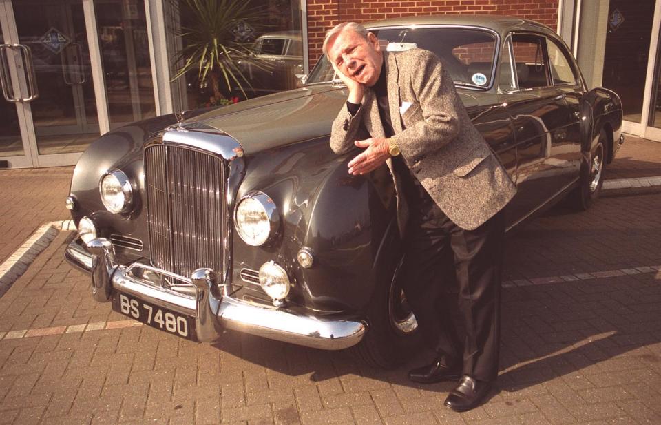 Comedian Norman Wisdom in London, saying a tearful goodbye to his 1956 Bentley S1 Continental Fastback, which has an estimated value of between  40,000 and   50,000. The vehicle is being offered for sale at Christies exceptional Motor cars and Automobilia sale.