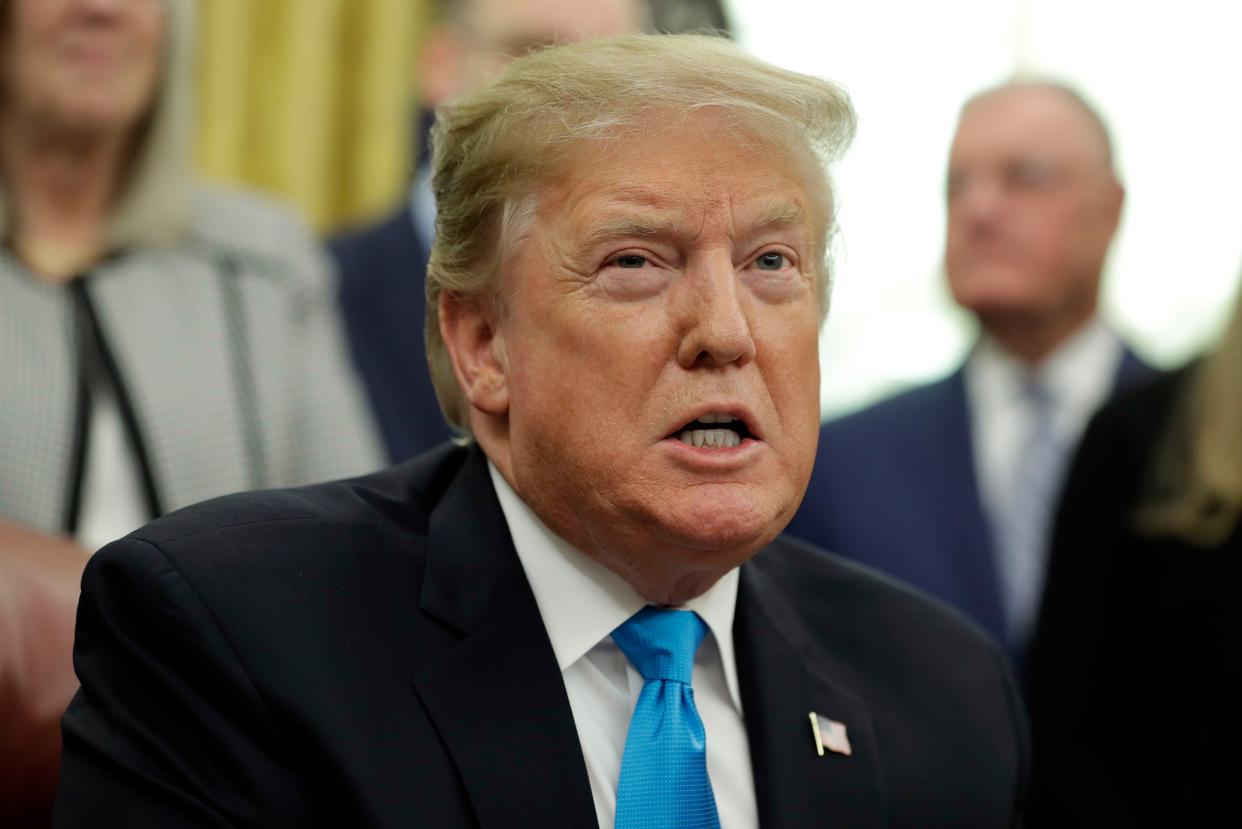 FILE - In this Feb. 19, 2019 file photo, President Donald Trump speaks during a signing ceremony for "Space Policy Directive 4" in the Oval Office of the White House in Washington. 