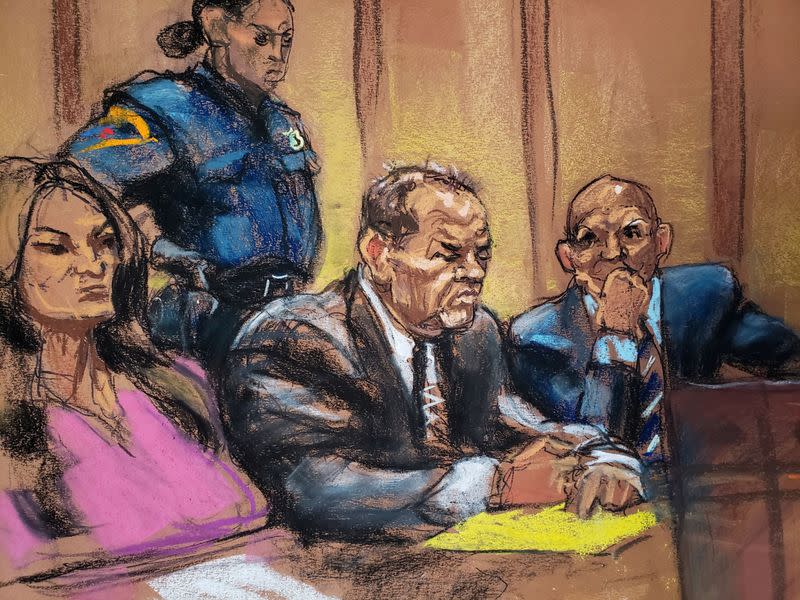 Film producer Harvey Weinstein sits alongside lawyers Donna Rotunno and Arthur Aidala