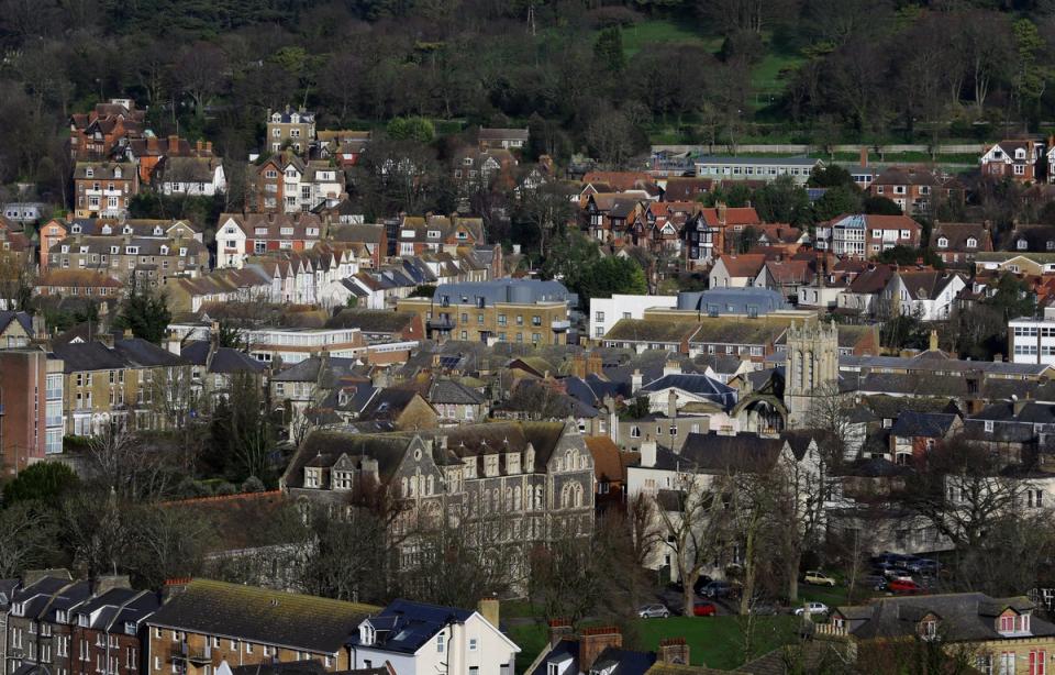 Mortgage borrowers whose deal directly tracks the base rate will see their payments increase by around £49 per month on average, adding up to nearly £600 annually, as a result of Thursday’s Bank of England base rate hike (Gareth Fuller/PA) (PA Archive)