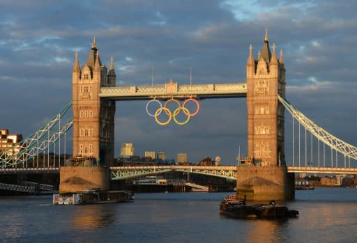 Tower Bridge decorated with the Olympic ring symbol, in central London. The razzmatazz of the London 2012 Olympics is a world away from the last Games held in London in 1948, when athletes had to survive on rations, stitch their own kit and wash it themselves