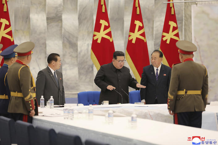 In this photo provided by the North Korean government, North Korean leader Kim Jong Un, center, attends a meeting of the Central Military Commission of the ruling Workers' Party in Pyongyang, North Korea Wednesday, June 22, 2022. Independent journalists were not given access to cover the event depicted in this image distributed by the North Korean government. The content of this image is as provided and cannot be independently verified. Korean language watermark on image as provided by source reads: "KCNA" which is the abbreviation for Korean Central News Agency. (Korean Central News Agency/Korea News Service via AP)