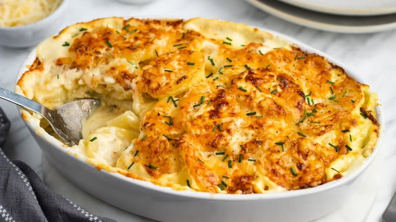 potatoes au gratin in baking dish