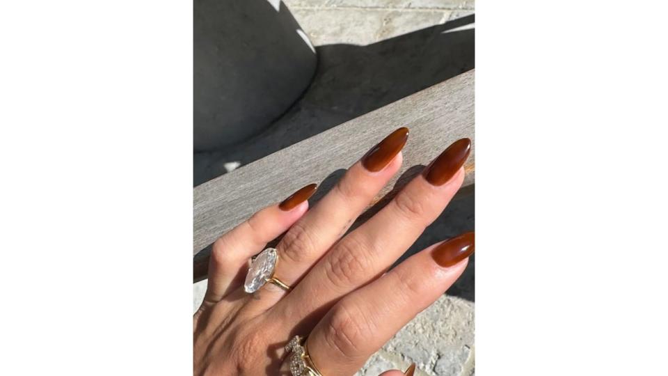 Hailey showcases her new push present - a diamond 'MOM' ring