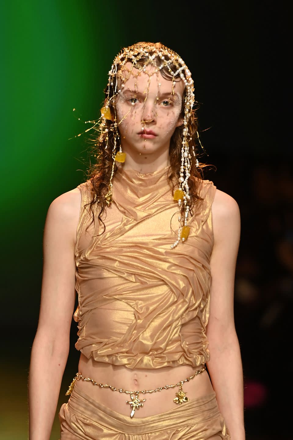 london, england february 17 a model walks the runway at the di petsa show during london fashion week february 2023 at the bfc newgen show space on february 17, 2023 in london, england photo by kate greenbfcgetty images