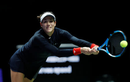 Tennis - WTA Tour Finals - Singapore Indoor Stadium, Singapore - October 22, 2017 Spain's Garbine Muguruza reacts during her group stage match with Latvia's Jelena Ostapenko REUTERS/Edgar Su