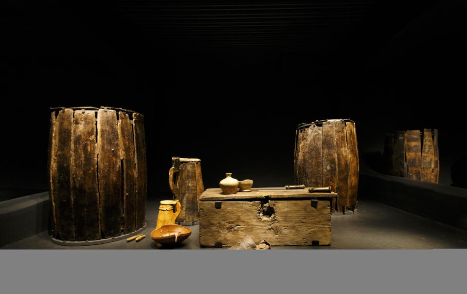 Sandals are kitchenware are on display at the Mary Rose museum. The artefacts and skeleton of the warship provide a unique time capsule into Tudor life (PA)