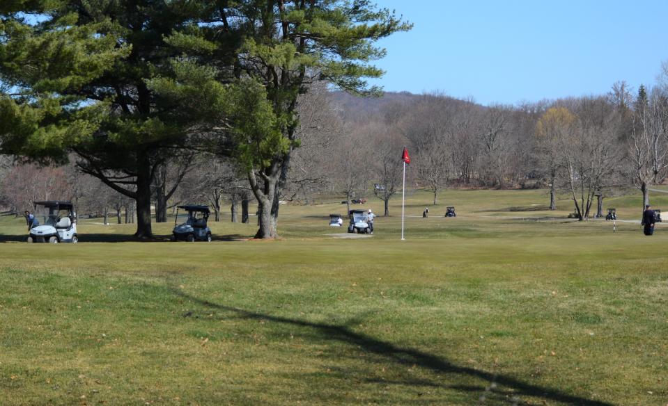 In this 2020 file photo, eight carts scatter about two holes at Putnam County Golf Course in Mahopac.