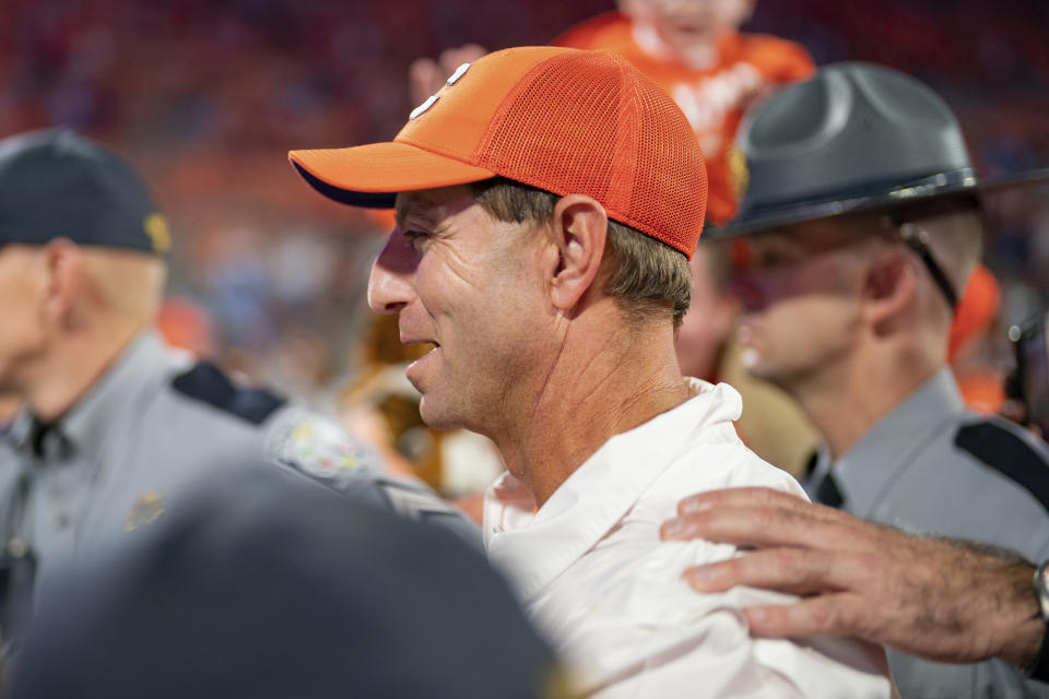 Clemson head coach Dabo Swinney walks off the field after defeating North Carolina in an NCAA college football game Saturday, Nov. 18, 2023, in Clemson, S.C. (AP Photo/Jacob Kupferman)