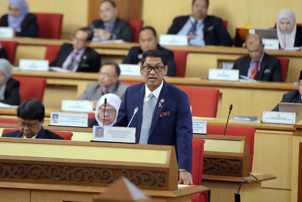 The Bill, suggested by Mentri Besar Datuk Seri Ahmad Faizal Azumu, will also lower the eligible age of electoral candidates from 21 to 18. — Picture by Farhan Najib