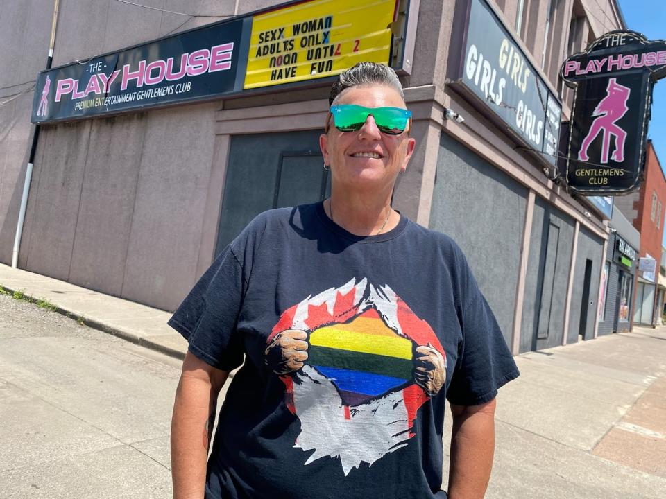 Windsor-Essex Pride Fest president Wendi Nicholson stands in front of The PlayHouse on Wyandotte Street east, which once was a gay bar more than a decade ago.