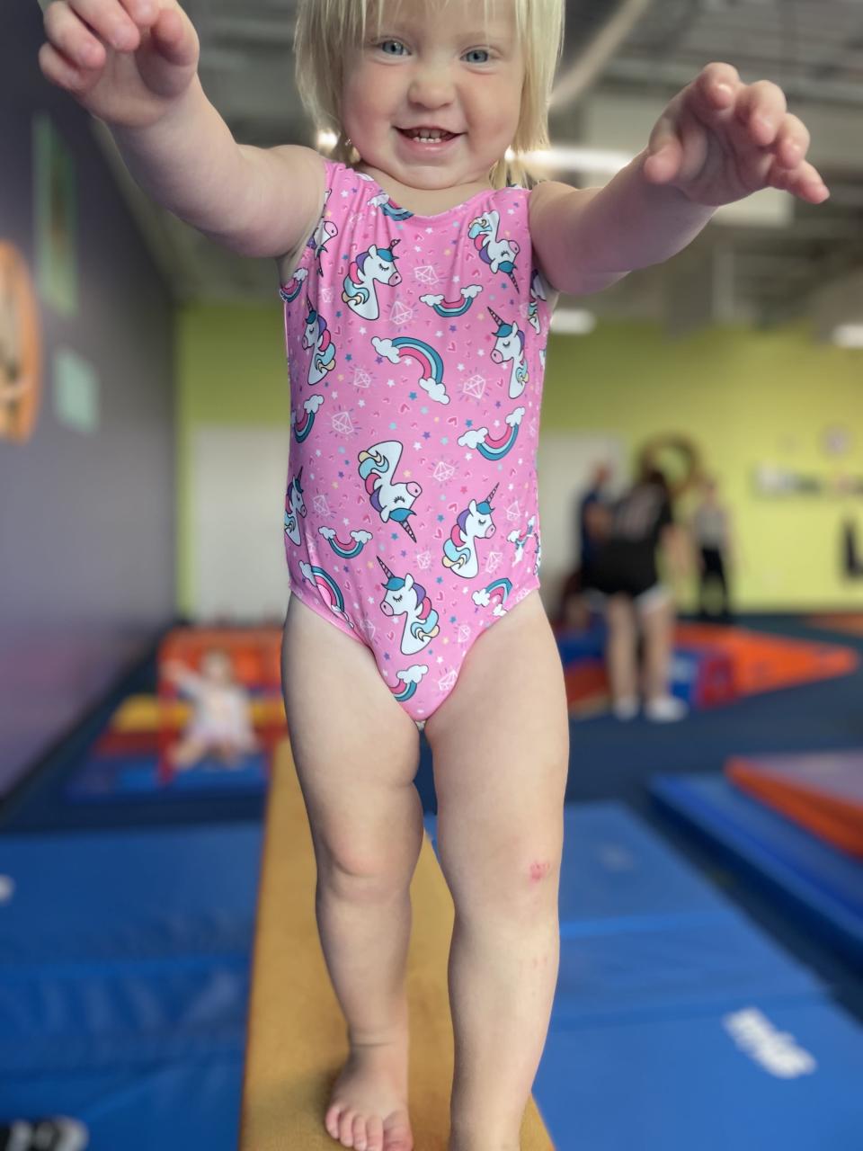 the author's daughter at gymnastics
