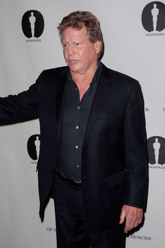 FILE PHOTO: Actor Ryan O'Neal arrives at the Academy Salute to Stanley Kubrick at the Academy of Motion Picture Arts and Sciences Samuel Goldwyn Theater in Beverly Hills, California