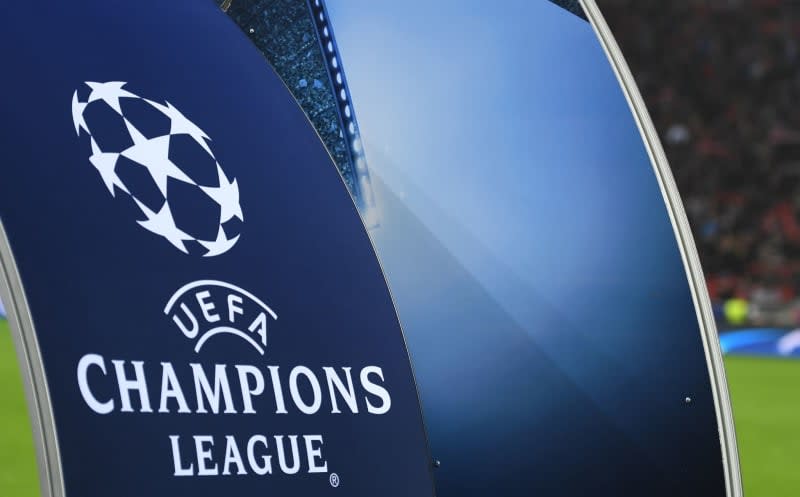 A large UEFA Champions League logo can be seen in the BayArena. Marius Becker/dpa