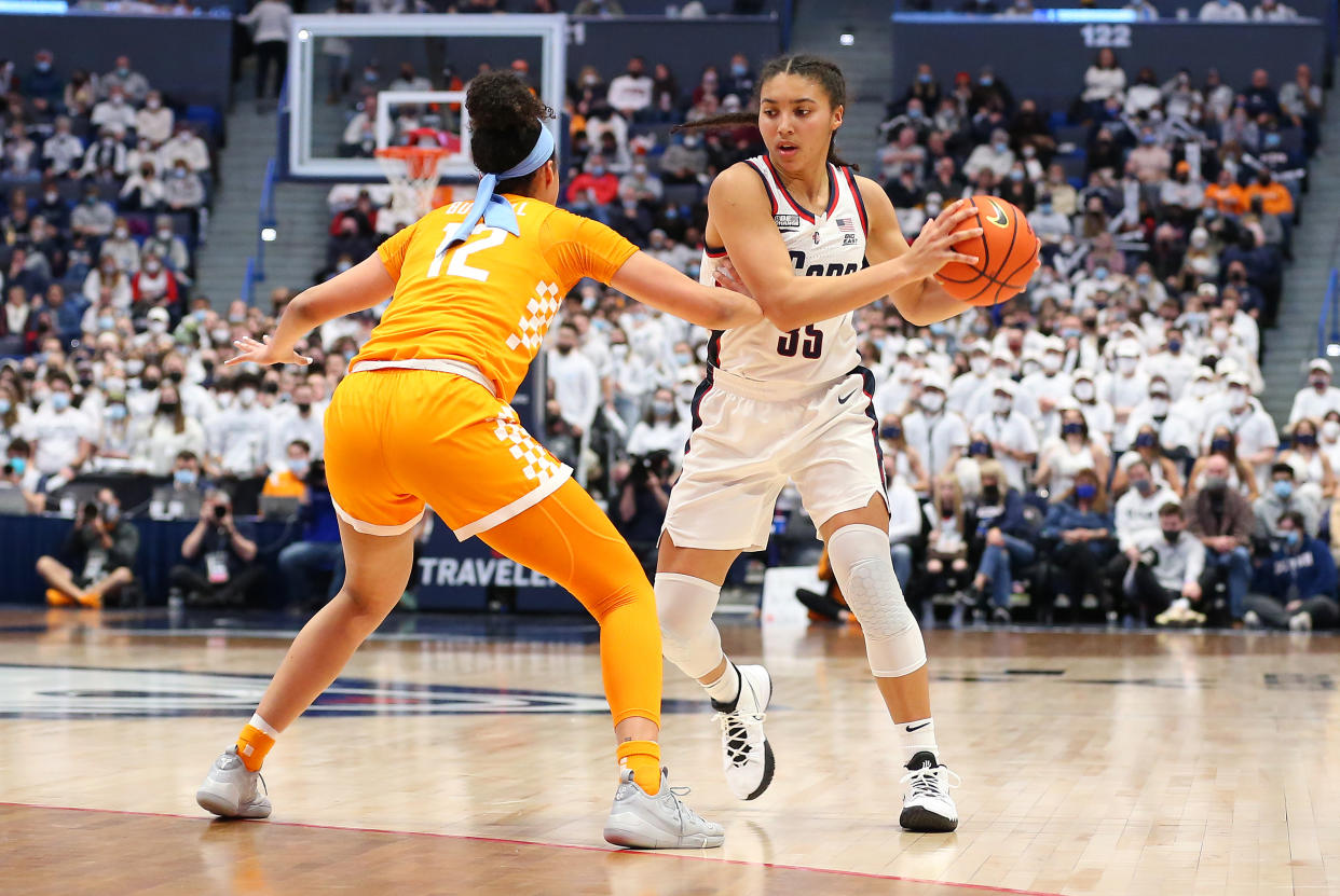 UConn guard Azzi Fudd goes against Tennessee guard Rae Burrell during their top-10 matchup on Feb. 6, 2022, in Hartford, Connecticut. (M. Anthony Nesmith/Icon Sportswire via Getty Images)