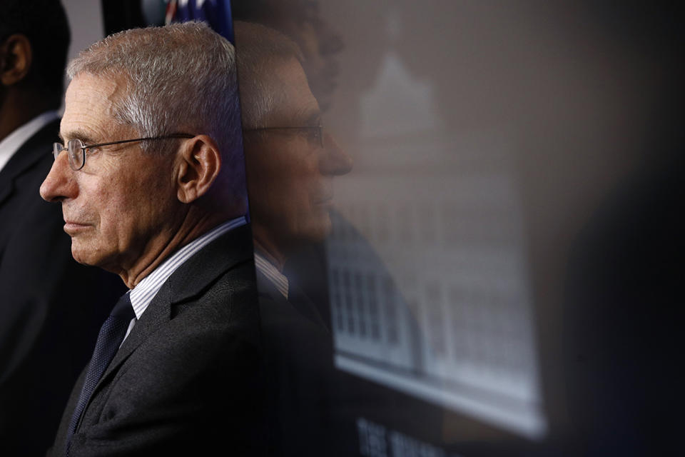 Director of the National Institute of Allergy and Infectious Diseases Dr. Anthony Fauci listens as President Donald Trump speaks during a coronavirus task force briefing at the White House, Saturday, March 21, 2020, in Washington. (AP Photo/Patrick Semansky)