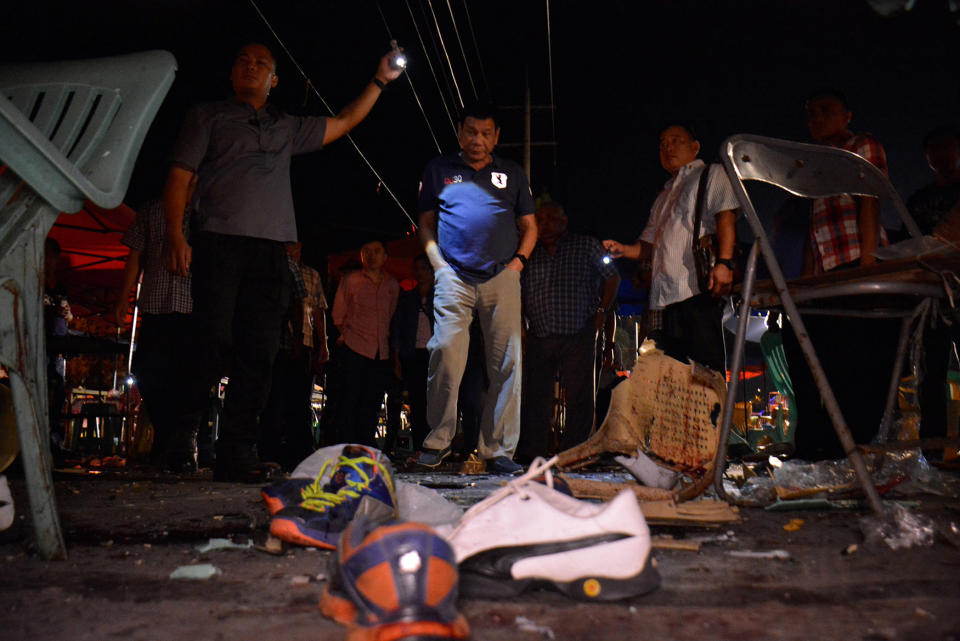 President Rodrigo Duterte visits blast site at a market in Davao City