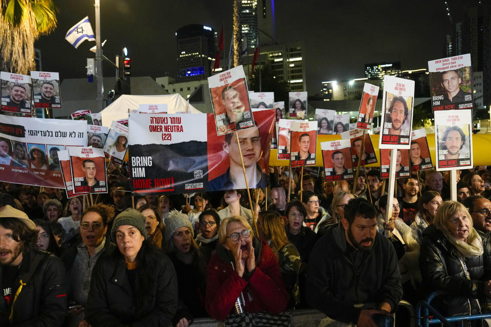 People attend a demonstration demanding the release of the hostages taken by Hamas militants into the Gaza Strip during the Oct. 7th attack, in Tel Aviv, Israel, Saturday, Jan. 27, 2024. (AP Photo/Ariel Schalit)