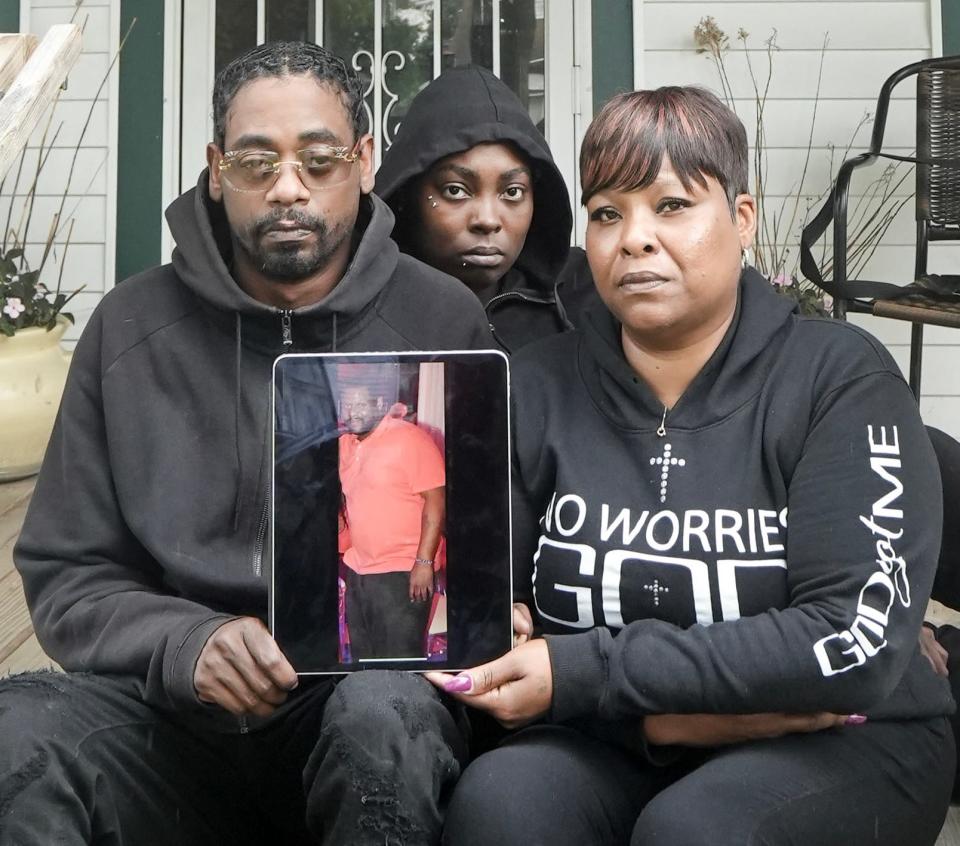 Darrell Giles, on the left is the brother of the deceased, Nayisha Mitchell, on the right is the sister of the deceased, and in the middle, is the sister-in-law of the deceased, Candice Miller, seen with a picture of Dvontaye Mitchell, a man killed after being held down by security on June 30 outside of a Hyatt hotel in Milwaukee. 'We're going to miss his presence. He's a good brother, dad, cousin, son, friend- all of that,' N. Mitchell said. She described how he had a kind heart and a big heart and how they are going to miss having him at all the family events. 'The fourth is on Thursday and we have this big family picnic planned that he won't be attending. We all look forward to being together and having a good time together.' She said the security guards that held down her brother should be ashamed on themselves.