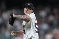 Houston Astros starting pitcher Hunter Brown delivers during the first inning of a baseball game against the New York Yankees, Saturday, March 30, 2024, in Houston. (AP Photo/Kevin M. Cox)