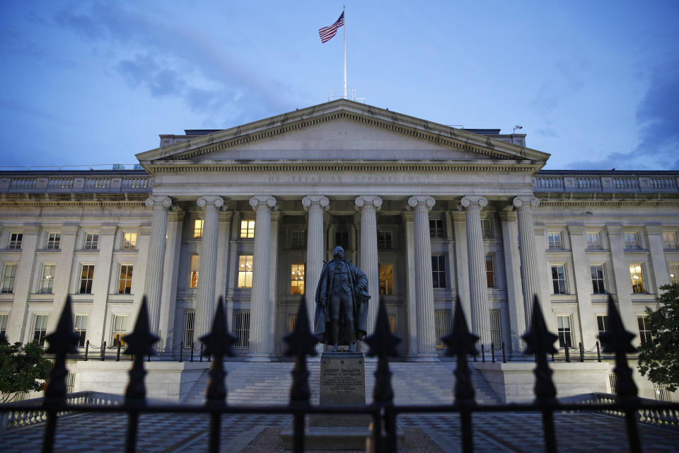 The U.S. Treasury Department building at dusk, Thursday, June 6, 2019, in Washington. (AP Photo/Patrick Semansky)