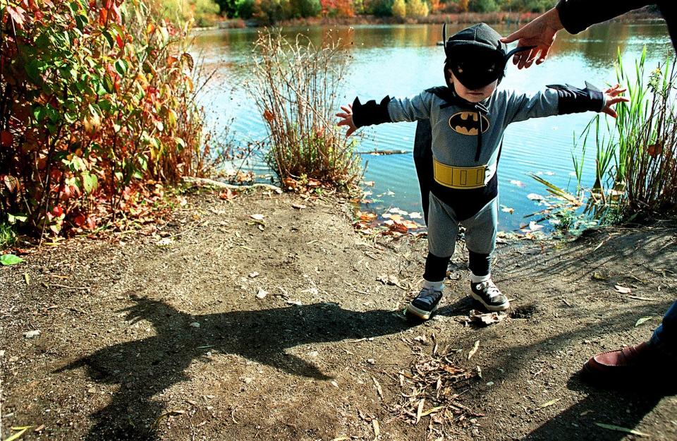 Jake Gelsomino, age 4, of Barrington, Rhode Island, was totally 'into the part' of playing Batman during the Roger Williams Park Zoo's 10th Annual Spooky Zoo Halloween held at the zoo in Providence, Rhode Island.