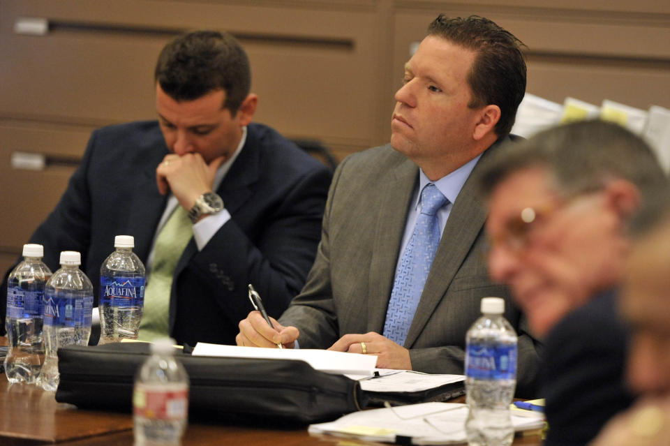 Former Fullerton police officer Jay Cicinelli listens to Orange County district attorney Tony Rackauckas' closing argument in the case against Cicinelli and fellow former officer Manuel Ramos in Santa Ana, Calif. Cicinelli and Ramos pleaded not guilty in the beating death of Kelly Thomas, 37, a mentally ill homeless man. Thomas died five days after a violent struggle with officers who were responding to a report of a man breaking into cars at a transit hub. (AP Photo/The Orange County Register, Joshua Sudock, Pool)