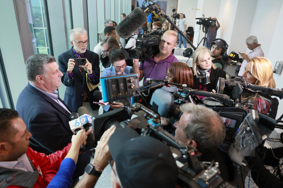 Tony Montalto, father of murder victim Gina Montalto, right, speaks with media after former Marjory Stoneman Douglas High School School Resource Officer Scot Peterson was found not guilty on all charges at the Broward County Courthouse in Fort Lauderdale, Fla., on Thursday, June 29, 2023. Peterson was acquitted of child neglect and other charges for failing to act during the Parkland school massacre, where 14 students and three staff members were murdered. (Mike Stocker/South Florida Sun-Sentinel via AP, Pool)