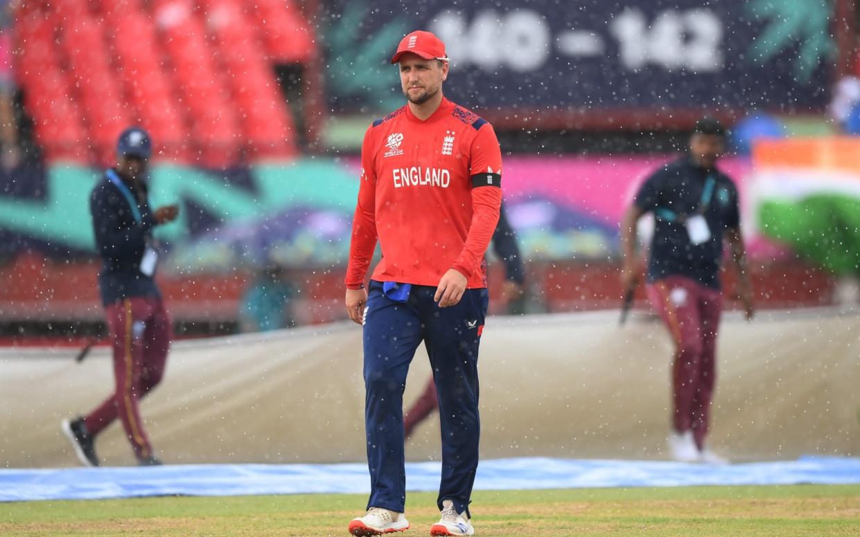 Liam Livingstone walks off after rain stops play