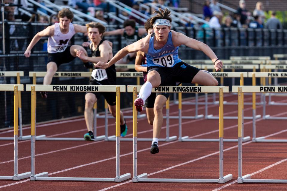 Saint Joseph's Luke Kaufhold wins the 300 Meter Hurdles during the high school sectionals track meet on Thursday, May 18, 2023, at Penn High School in Mishawaka, Indiana.