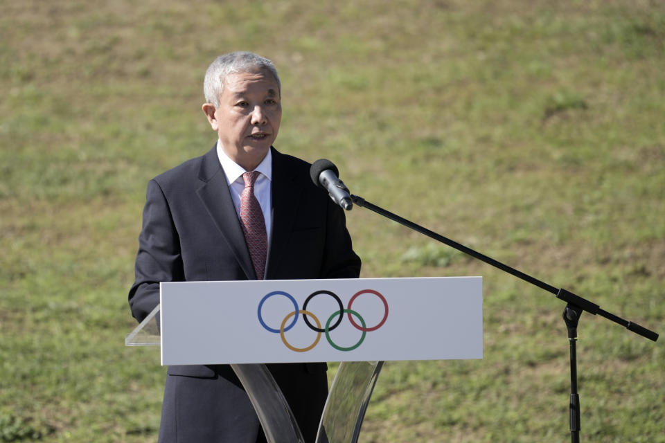 Vice-President of the Organising Committee of Beijing 2022 Winter Olympics and Paralympics Yu Zaiqing delivers a speech before the lighting of the Olympic flame at Ancient Olympia site, birthplace of the ancient Olympics in southwestern Greece, Monday, Oct. 18, 2021. The flame will be transported by torch relay to Beijing, China, which will host the Feb. 4-20, 2022 Winter Olympics. (AP Photo/Petros Giannakouris)