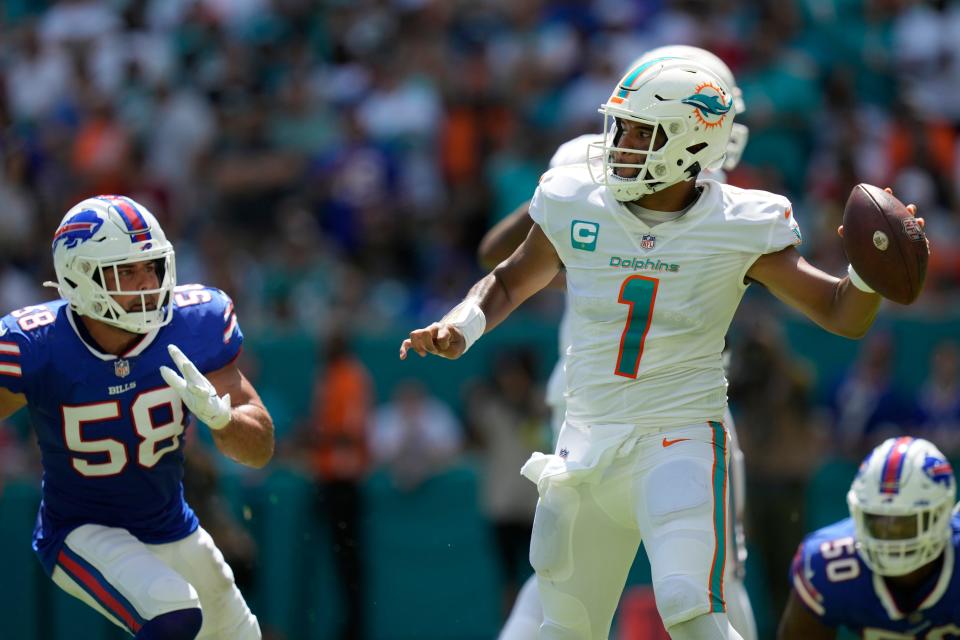 Buffalo Bills linebacker Matt Milano (58) rushes towards Miami Dolphins quarterback Tua Tagovailoa (1) before he was injured on a play during the first half of an NFL football game, Sunday, Sept. 25, 2022, in Miami Gardens. (AP Photo/Rebecca Blackwell)