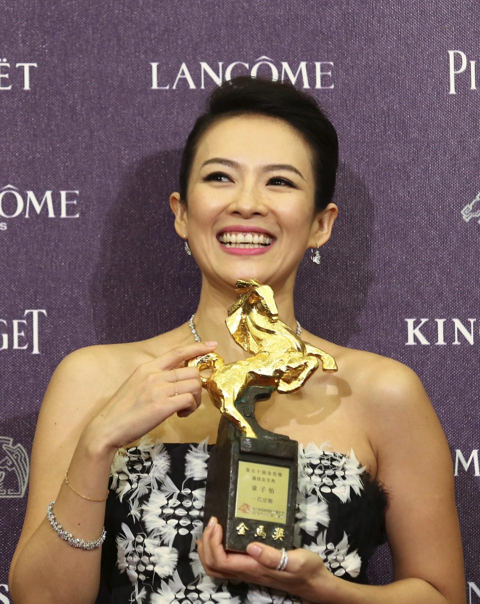 Chinese actress Zhang Ziyi celebrates winning the Best Leading Actress for "The Grandmaster" at the 50th Golden Horse Film Awards in Taipei