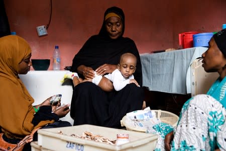 The Wider Image: Tanzania's Zanzibar begins to register traditional healers