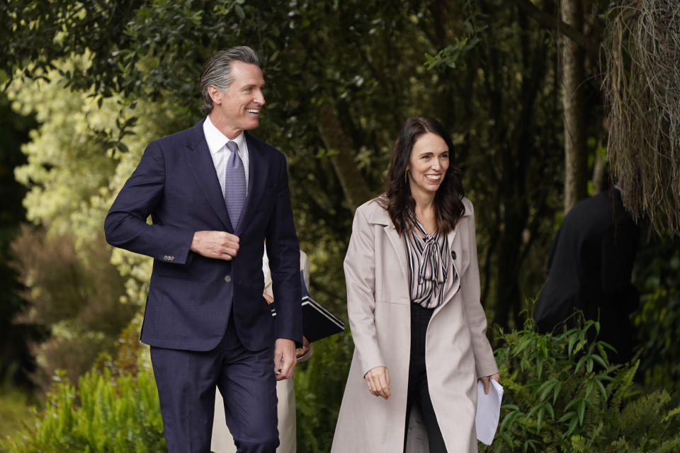 California Gov. Gavin Newsom and New Zealand Prime Minister Jacinda Ardern walk together through the San Francisco Botanical Garden at Golden Gate Park in San Francisco, Friday, May 27, 2022. Gov. Newsom met with Ardern in Golden Gate Park "to establish a new international partnership tackling climate change." (AP Photo/Eric Risberg)