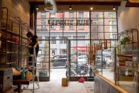 NEW YORK, NEW YORK - MAY 06: An employee wearing a mask cleans the inside of the restaurant, Blue Stripes Cacao Shop as it prepares to reopen for takeaway and delivery orders after being closed for over a month amid the coronavirus pandemic on May 6, 2020 in New York City. Governor Andrew Cuomo made the announcement that all bars and restaurants must close by on March 16th unless it was takeout or delivery. COVID-19 has spread to most countries around the world, claiming over 263,000 lives with over 3.8 million cases. (Photo by Alexi Rosenfeld/Getty Images)