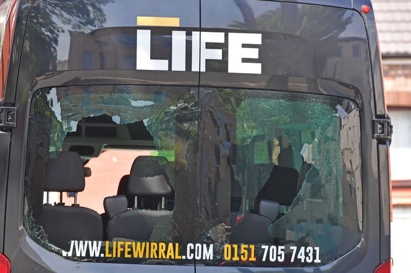 A smashed window of a van at Life Wirral School in Wallasey