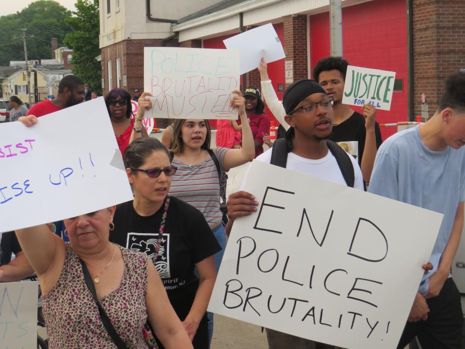 About 50 protesters march in Dover Sunday following the release of a video that shows a Dover officer punching a man in the face while he appeared to be resisting arrest early that morning, but was immobilized by other officers. May 19, 2019