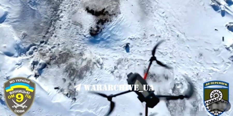 Falling to the ground, the enemy quadcopter exploded