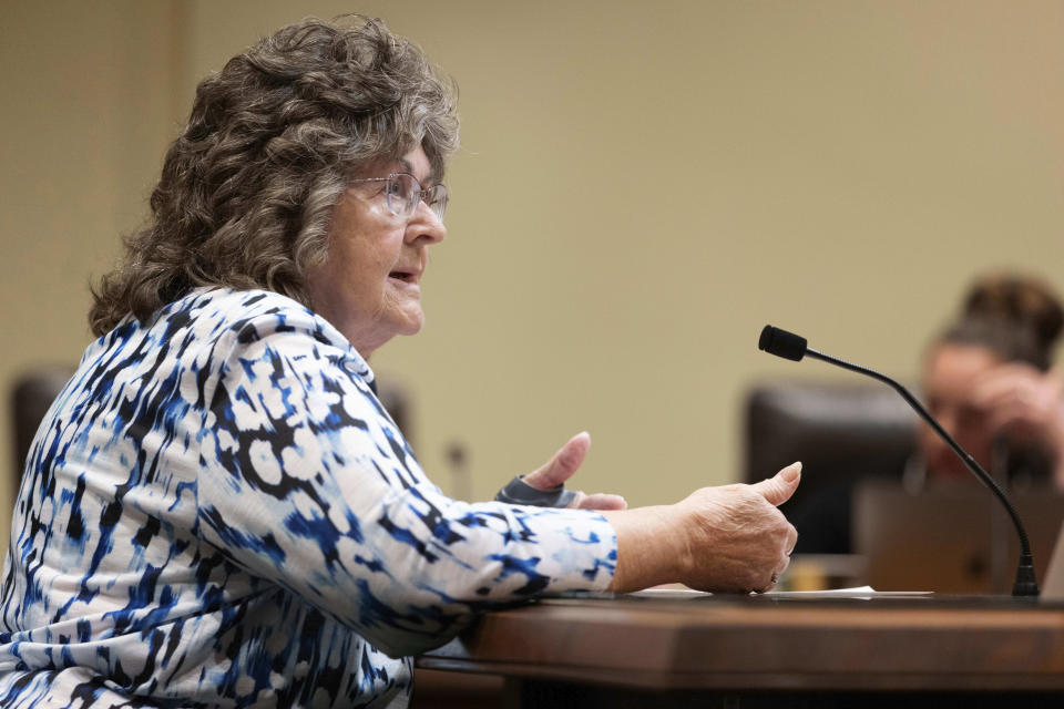 Kathy Wilmot, a member of the University of Nebraska Board of Regents, testifies against LB20, a bill to provide restoration of voting rights upon completion of a felony sentence or probation for a felony, during a hearing before the Government, Military and Veterans Affairs committee on Wednesday, Feb. 22, 2023, at the Nebraska state Capitol in Lincoln, Neb. Wilcot stressed she was speaking as an individual and not on behalf of the university. (AP Photo/Rebecca S. Gratz)