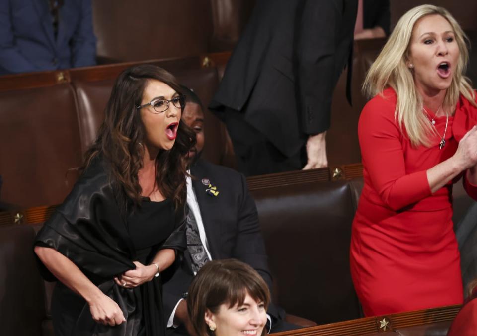 <div class="inline-image__caption"> <p>Rep. Lauren Boebert (R-CO) and Rep. Marjorie Taylor Greene scream “Build the Wall” as President Joe Biden delivers the State of the Union address in March.</p> </div> <div class="inline-image__credit"> Evelyn Hockstein-Pool/Getty </div>