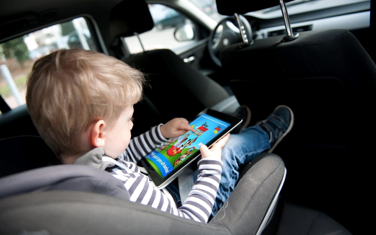 If you want some quiet time on a long drive, you should consider handing your little ones a tablet