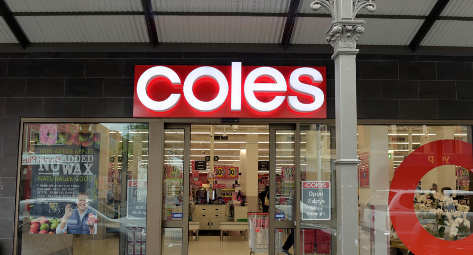 Photo of the front of a Coles store.